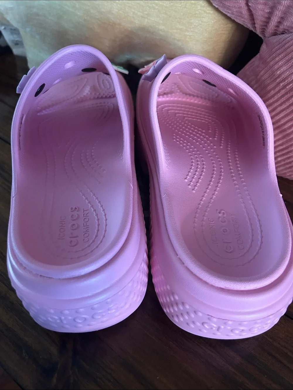 Crocs Pink stomp slides with charms